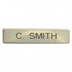 2.5" x .625" Metal Badge with Clutch Back, available in Glossy Gold or Silver, 2.5" wide x .625" tall